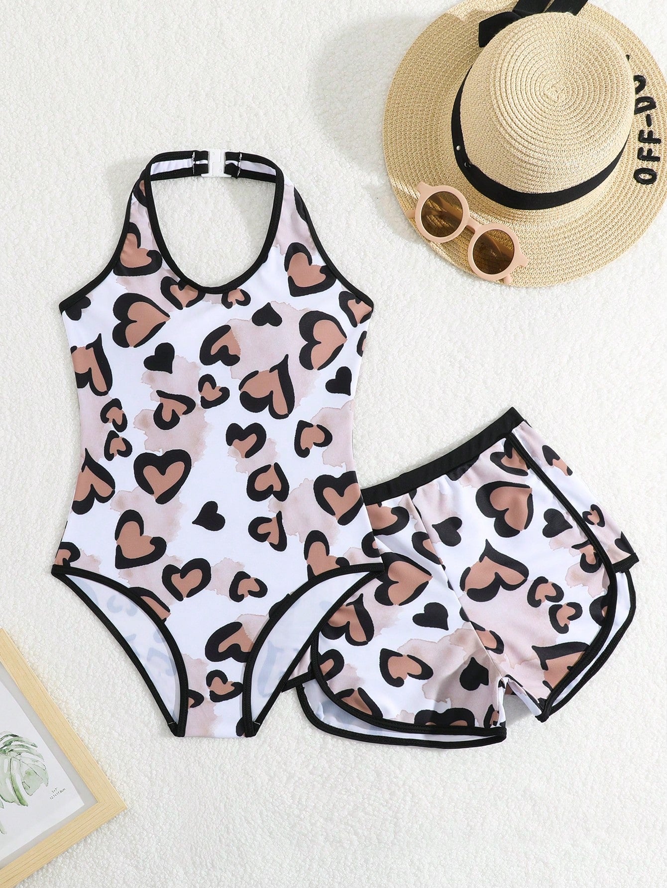 Girls 2-piece swimwear set featuring a butterfly print halter swimsuit top and separate mid-waist shorts in multicolor.