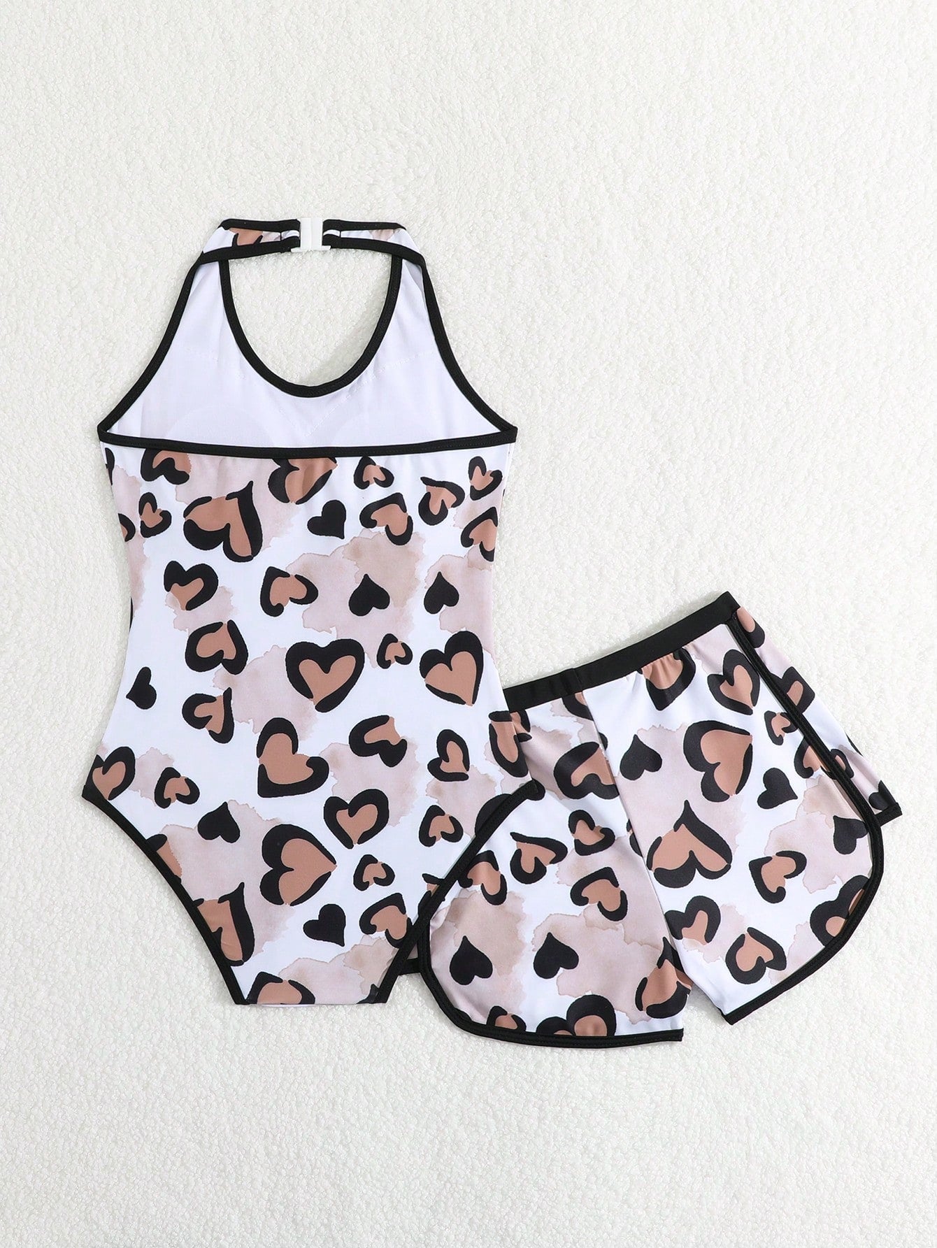 Girls 2-piece swimwear set featuring a butterfly print halter swimsuit top and separate mid-waist shorts in multicolor.