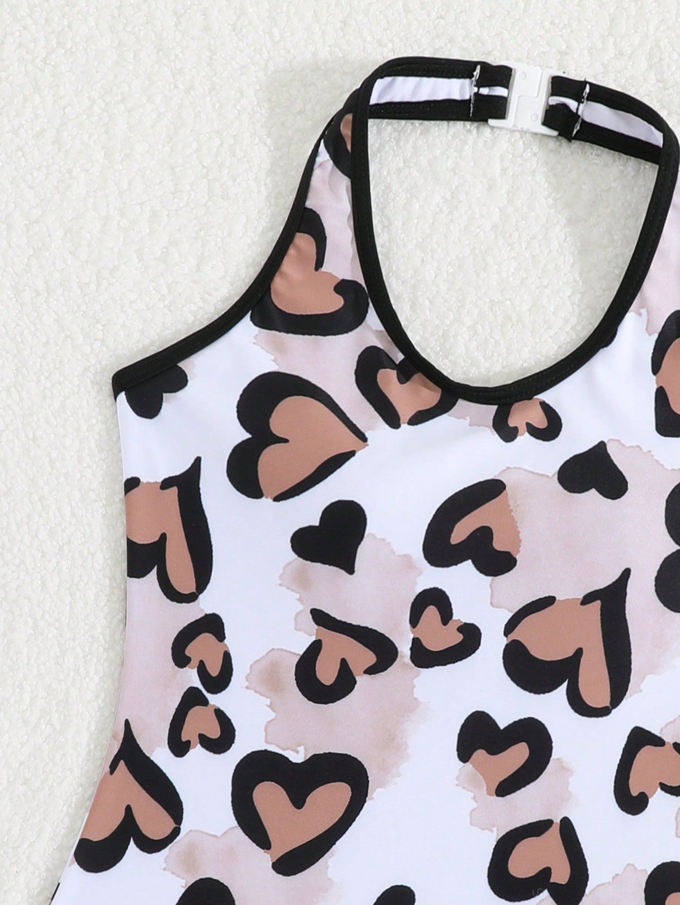 Girls 2-piece swimwear set featuring a butterfly print halter swimsuit top and separate mid-waist shorts in multicolor.