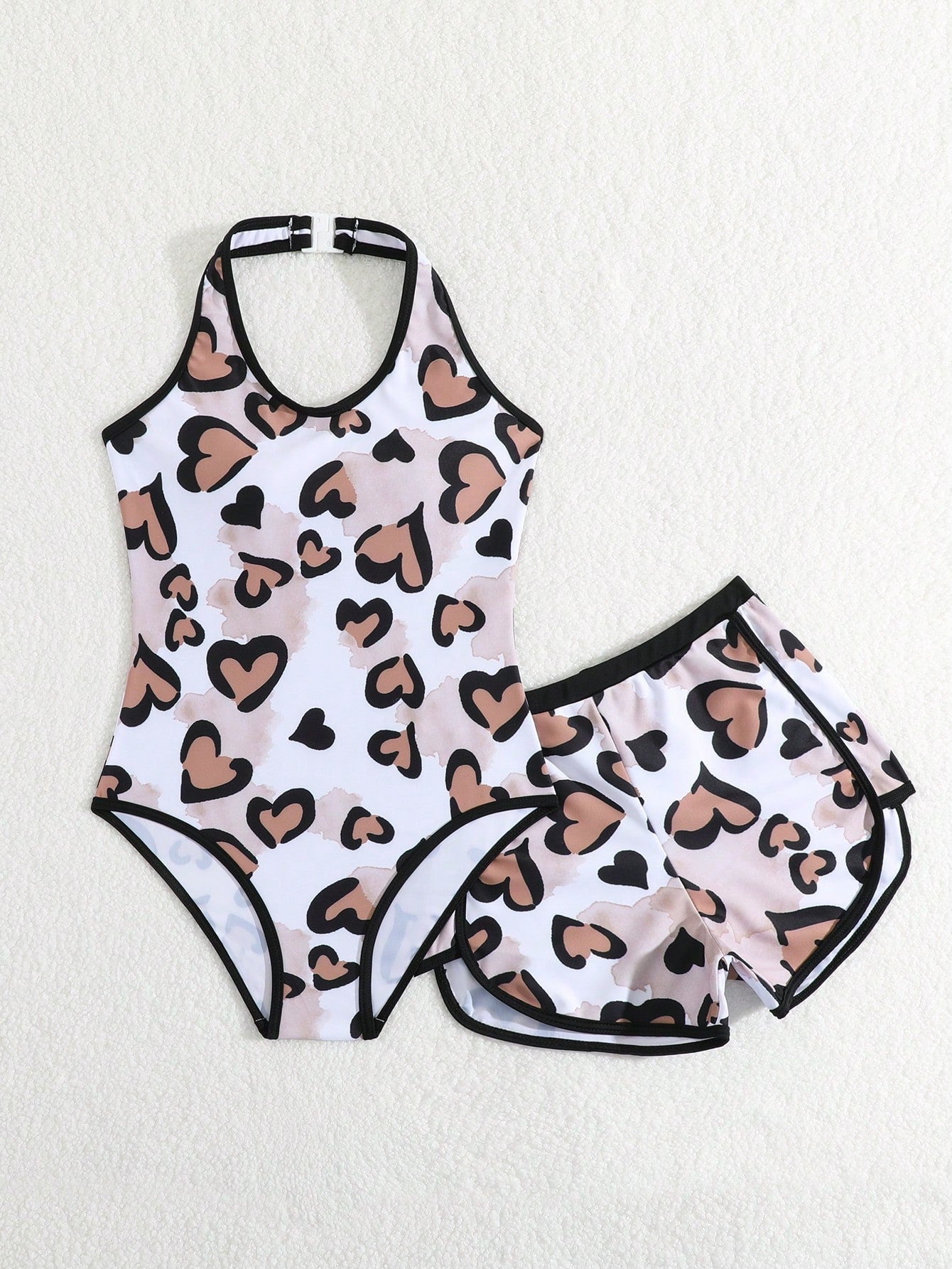Girls 2-piece swimwear set featuring a butterfly print halter swimsuit top and separate mid-waist shorts in multicolor.