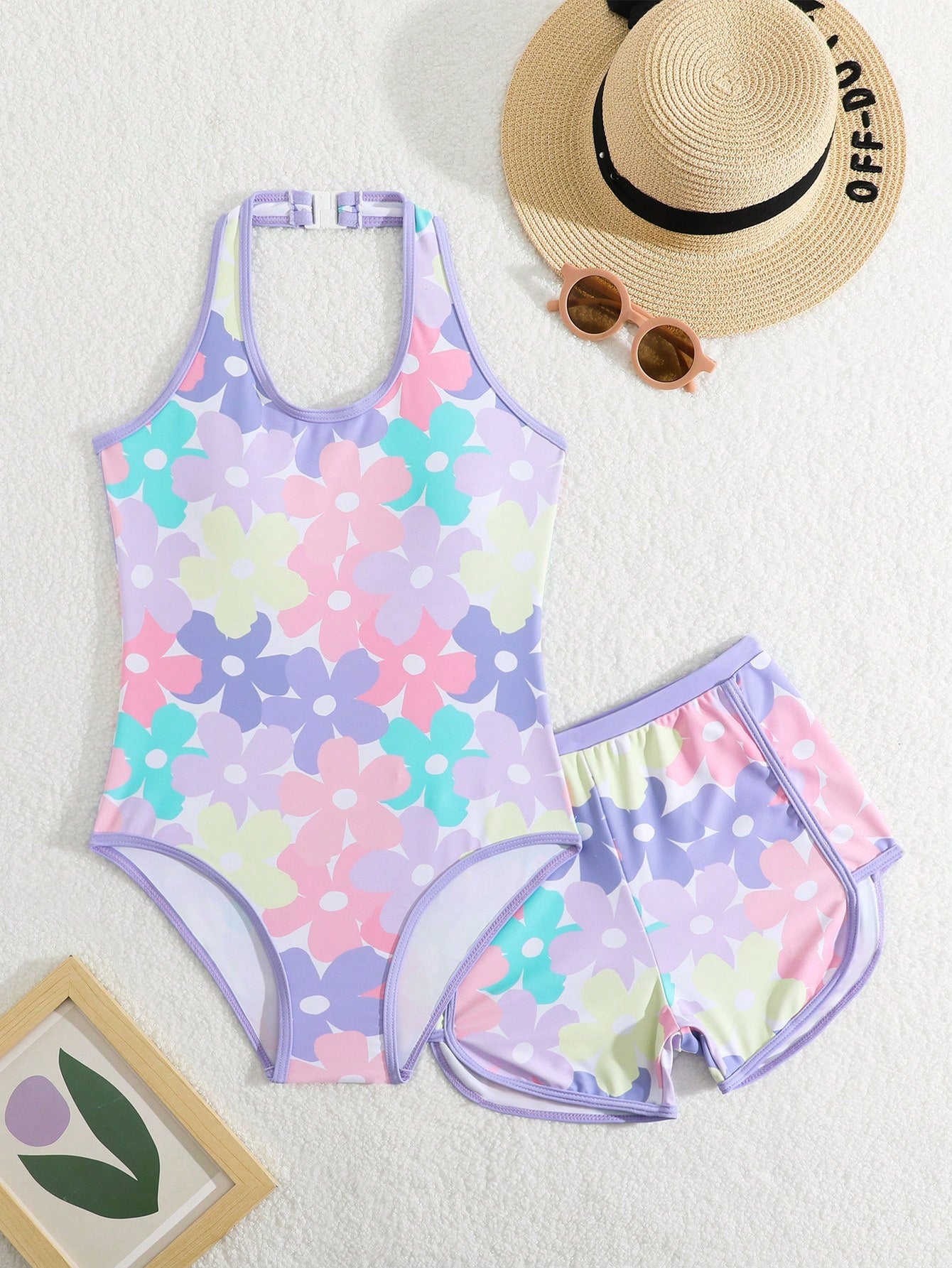 Girls 2-piece swimwear set featuring a butterfly print halter swimsuit top and separate mid-waist shorts in multicolor.