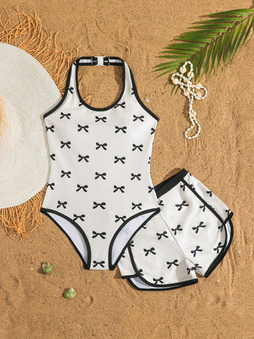 Girls 2-piece swimwear set featuring a butterfly print halter swimsuit top and separate mid-waist shorts in multicolor.