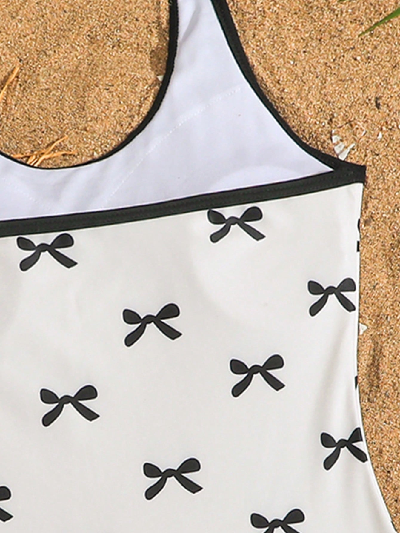 Girls 2-piece swimwear set featuring a butterfly print halter swimsuit top and separate mid-waist shorts in multicolor.