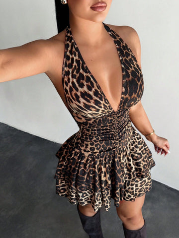 Women's sleeveless mini dress with leopard print, halter neckline, backless design, high waist, and tiered ruffle hem in a slim A-line fit.