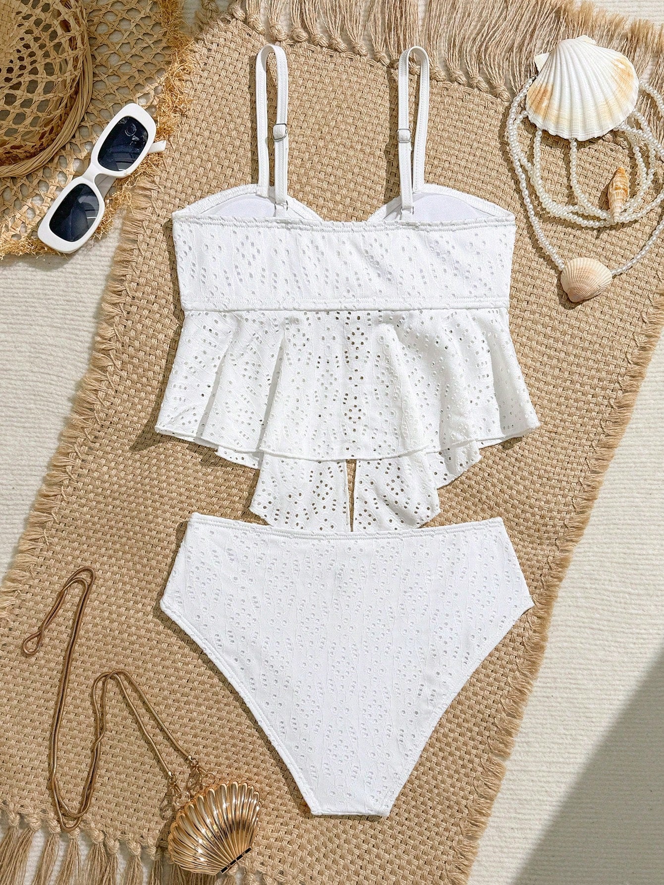 Tween girls two-piece tankini swimwear set with spaghetti straps, asymmetrical design, and 3D rose detail. Features a plant-pattern top and mid-waist bottoms in stretchy fabric for beach or pool wear.