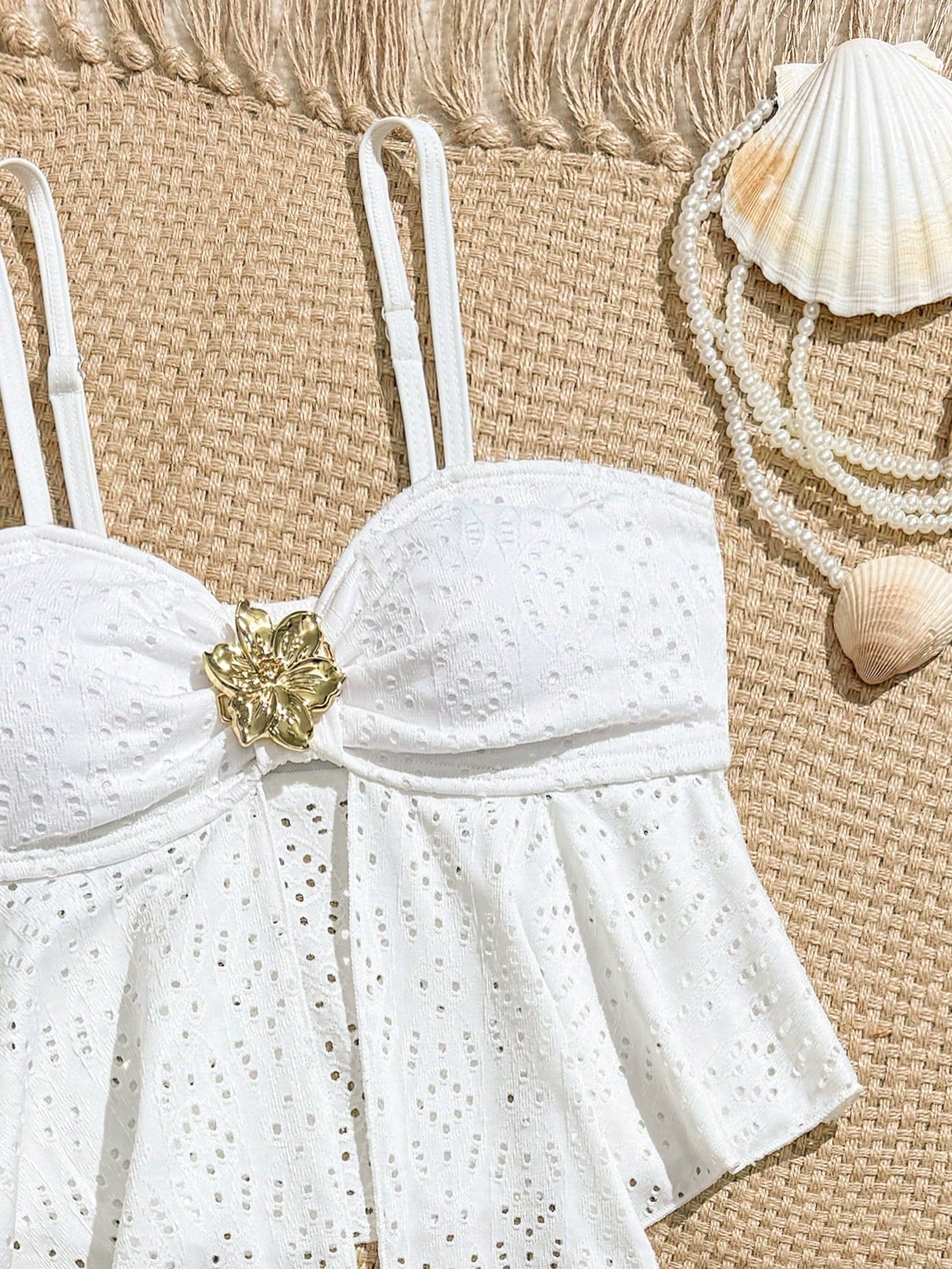 Tween girls two-piece tankini swimwear set with spaghetti straps, asymmetrical design, and 3D rose detail. Features a plant-pattern top and mid-waist bottoms in stretchy fabric for beach or pool wear.