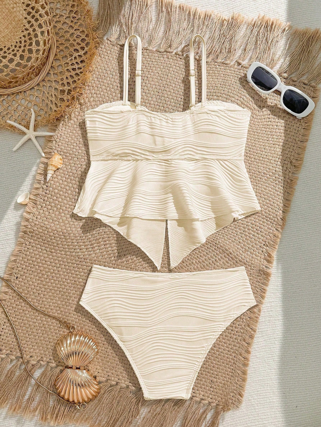Tween girls two-piece tankini swimwear set with spaghetti straps, asymmetrical design, and 3D rose detail. Features a plant-pattern top and mid-waist bottoms in stretchy fabric for beach or pool wear.