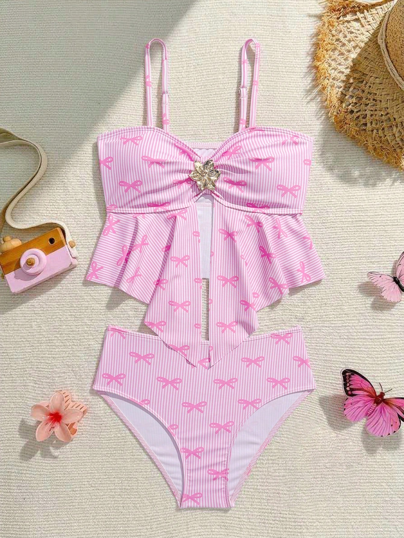 Tween girls two-piece tankini swimwear set with spaghetti straps, asymmetrical design, and 3D rose detail. Features a plant-pattern top and mid-waist bottoms in stretchy fabric for beach or pool wear.