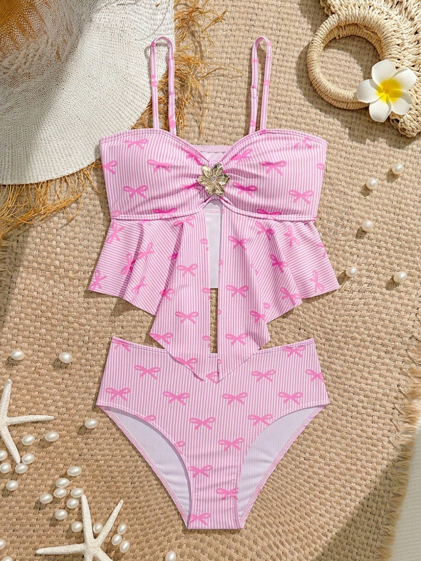 Tween girls two-piece tankini swimwear set with spaghetti straps, asymmetrical design, and 3D rose detail. Features a plant-pattern top and mid-waist bottoms in stretchy fabric for beach or pool wear.