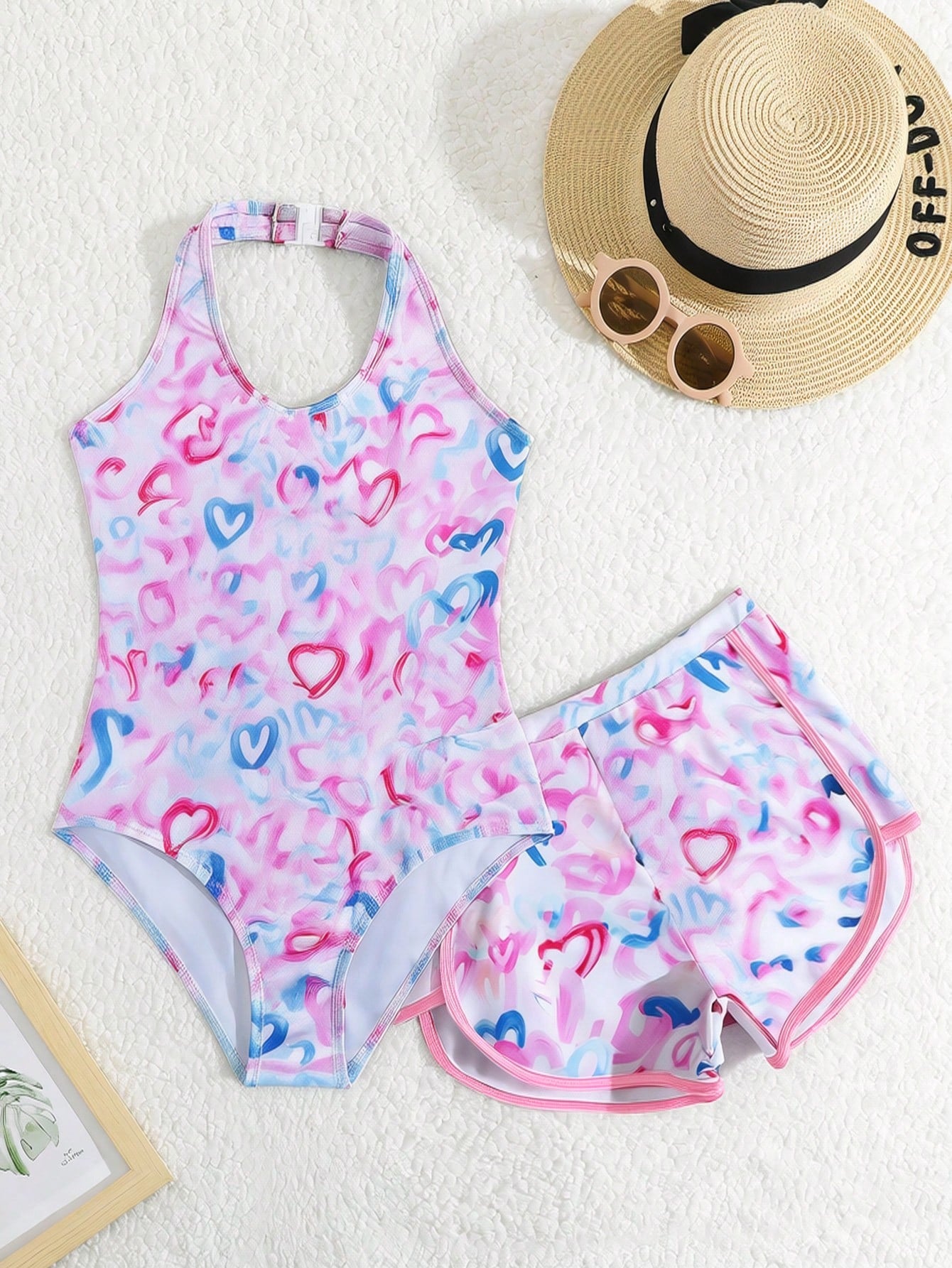 Girls 2-piece swimwear set featuring a butterfly print halter swimsuit top and separate mid-waist shorts in multicolor.