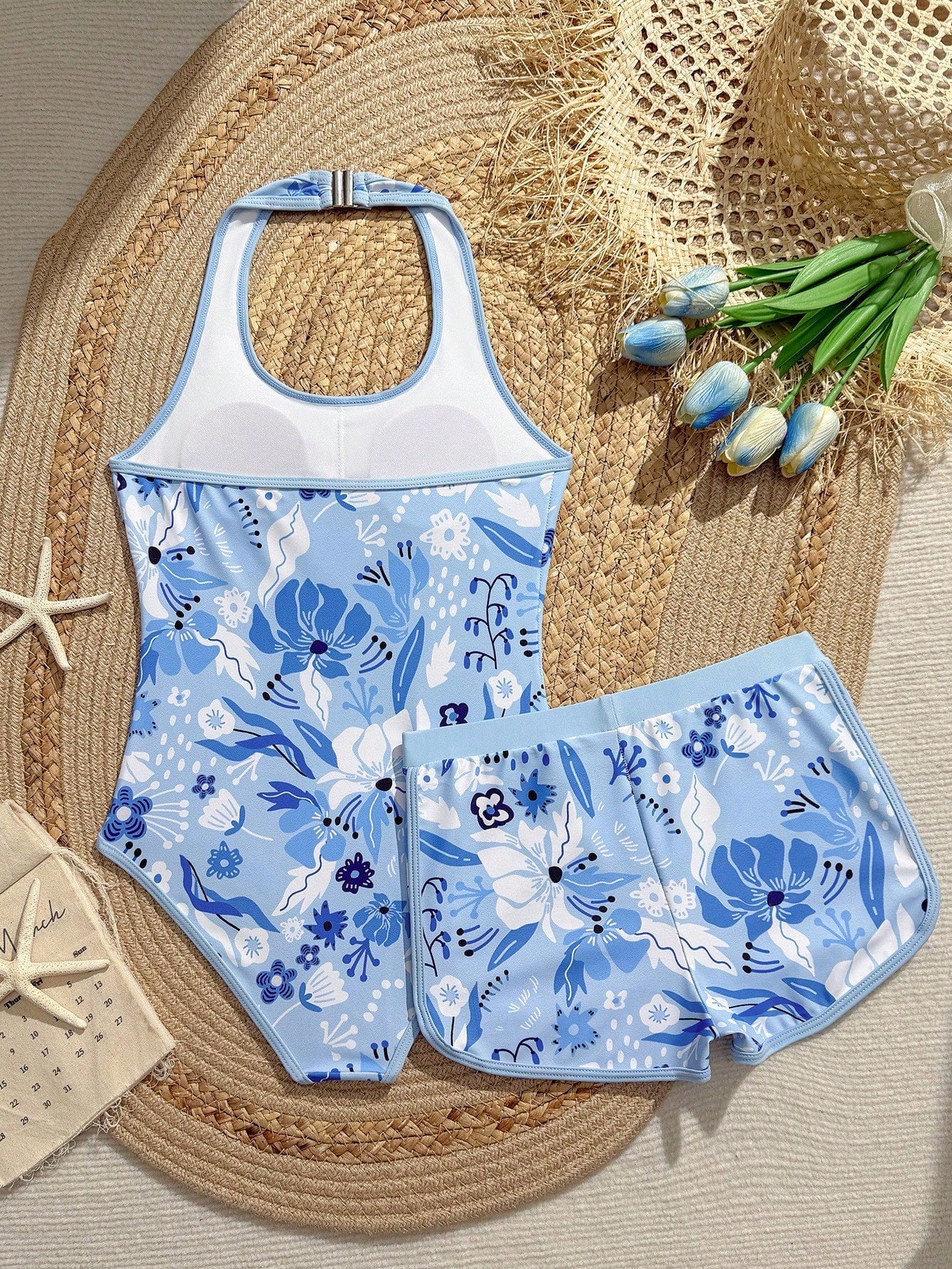 Girls 2-piece swimwear set featuring a butterfly print halter swimsuit top and separate mid-waist shorts in multicolor.