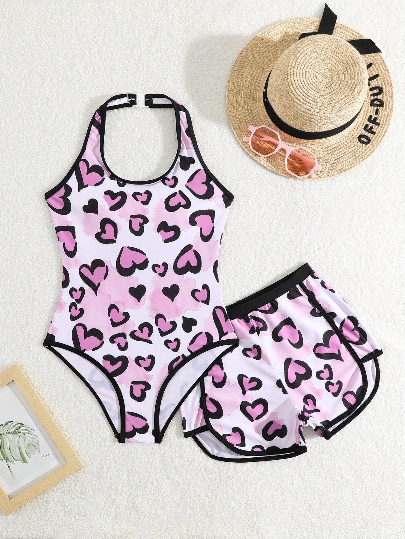 Girls 2-piece swimwear set featuring a butterfly print halter swimsuit top and separate mid-waist shorts in multicolor.