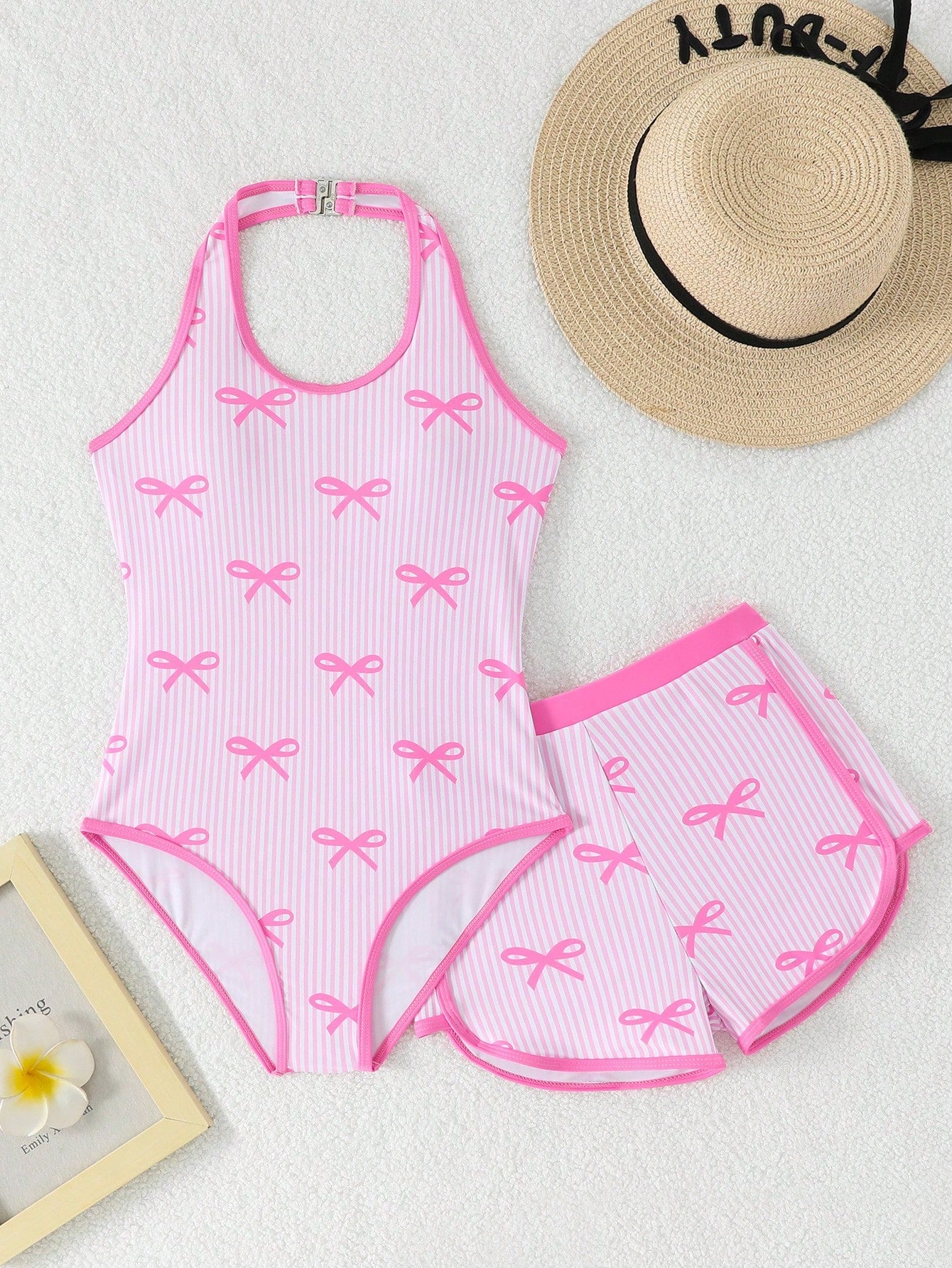Girls 2-piece swimwear set featuring a butterfly print halter swimsuit top and separate mid-waist shorts in multicolor.