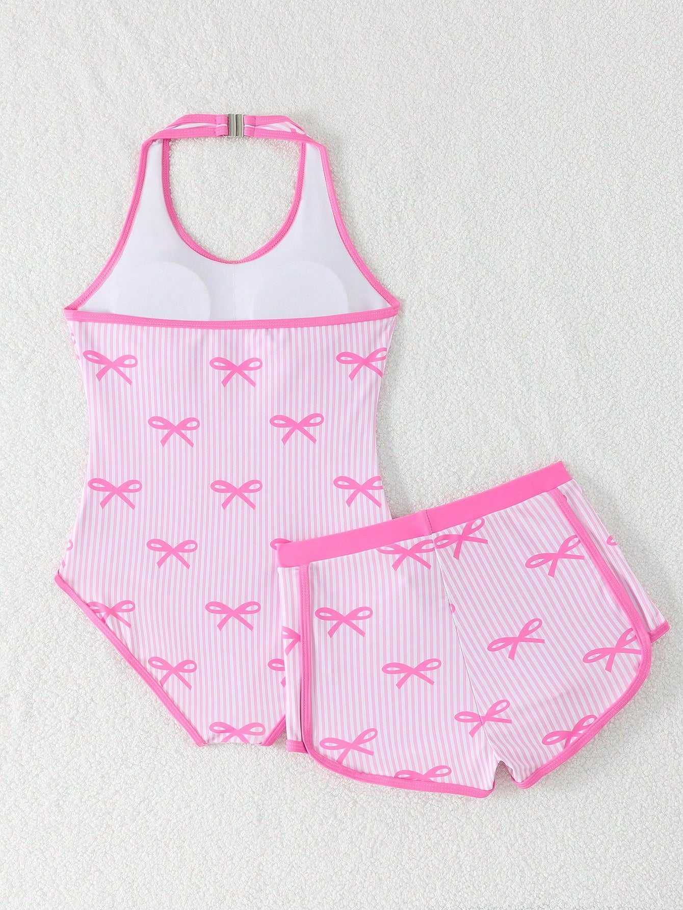 Girls 2-piece swimwear set featuring a butterfly print halter swimsuit top and separate mid-waist shorts in multicolor.