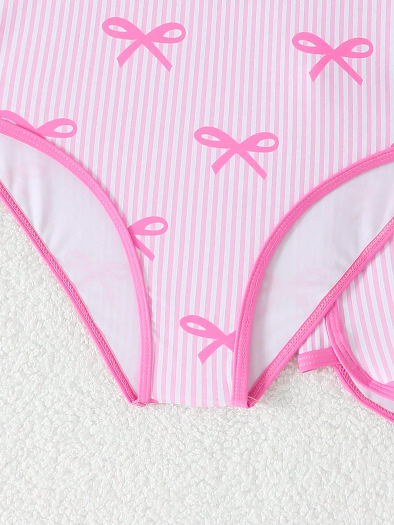 Girls 2-piece swimwear set featuring a butterfly print halter swimsuit top and separate mid-waist shorts in multicolor.