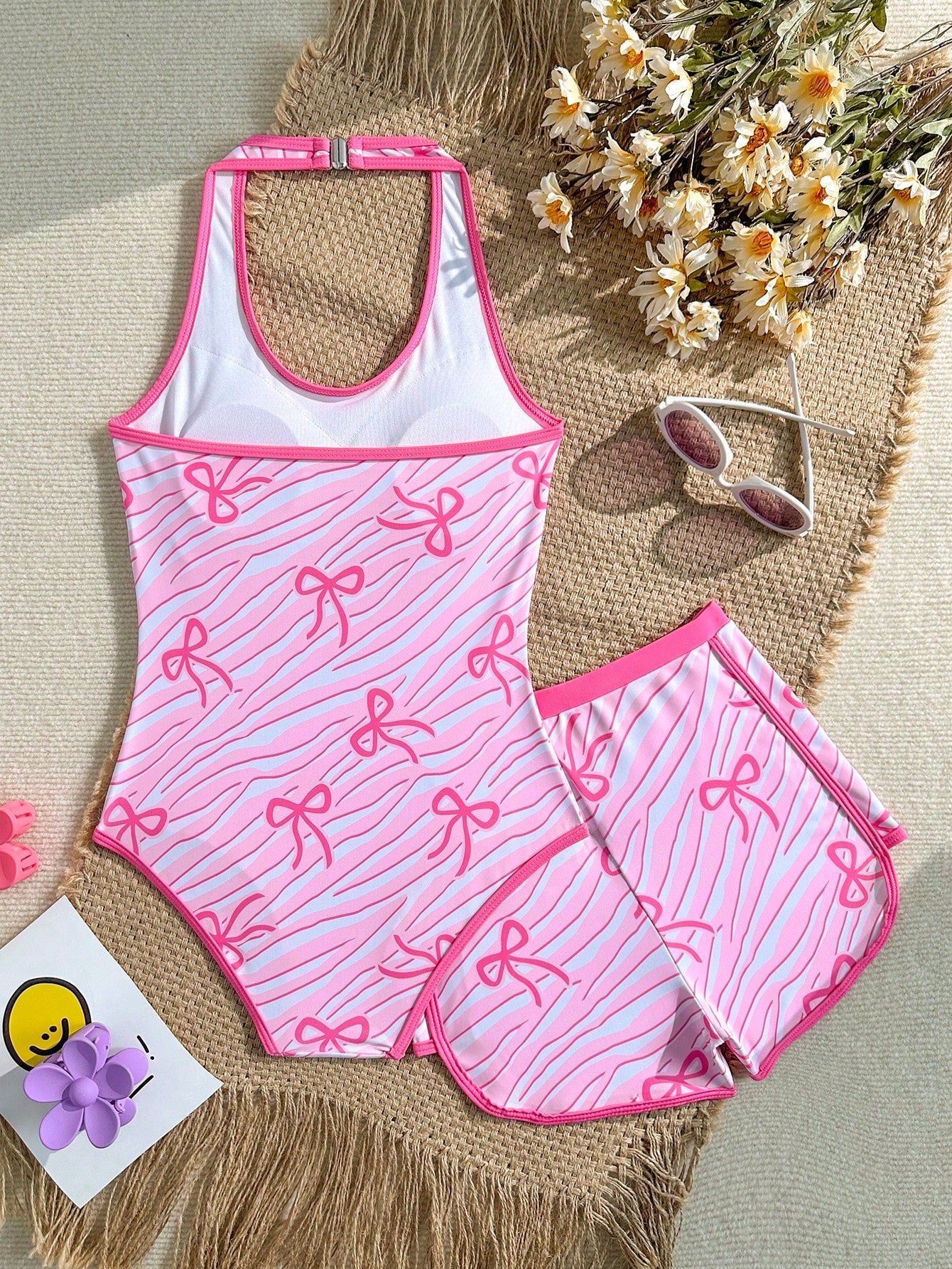 Girls 2-piece swimwear set featuring a butterfly print halter swimsuit top and separate mid-waist shorts in multicolor.