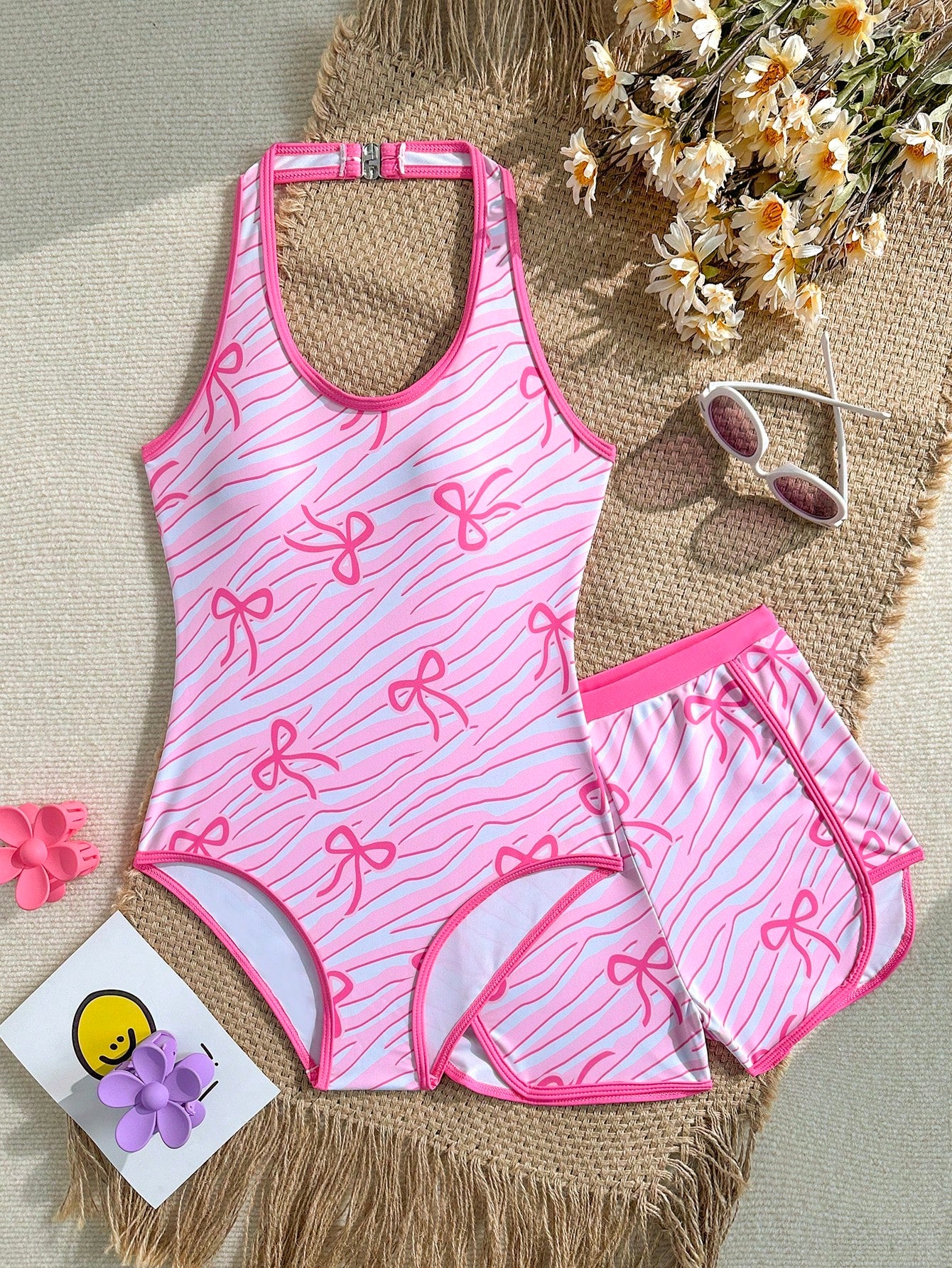Girls 2-piece swimwear set featuring a butterfly print halter swimsuit top and separate mid-waist shorts in multicolor.