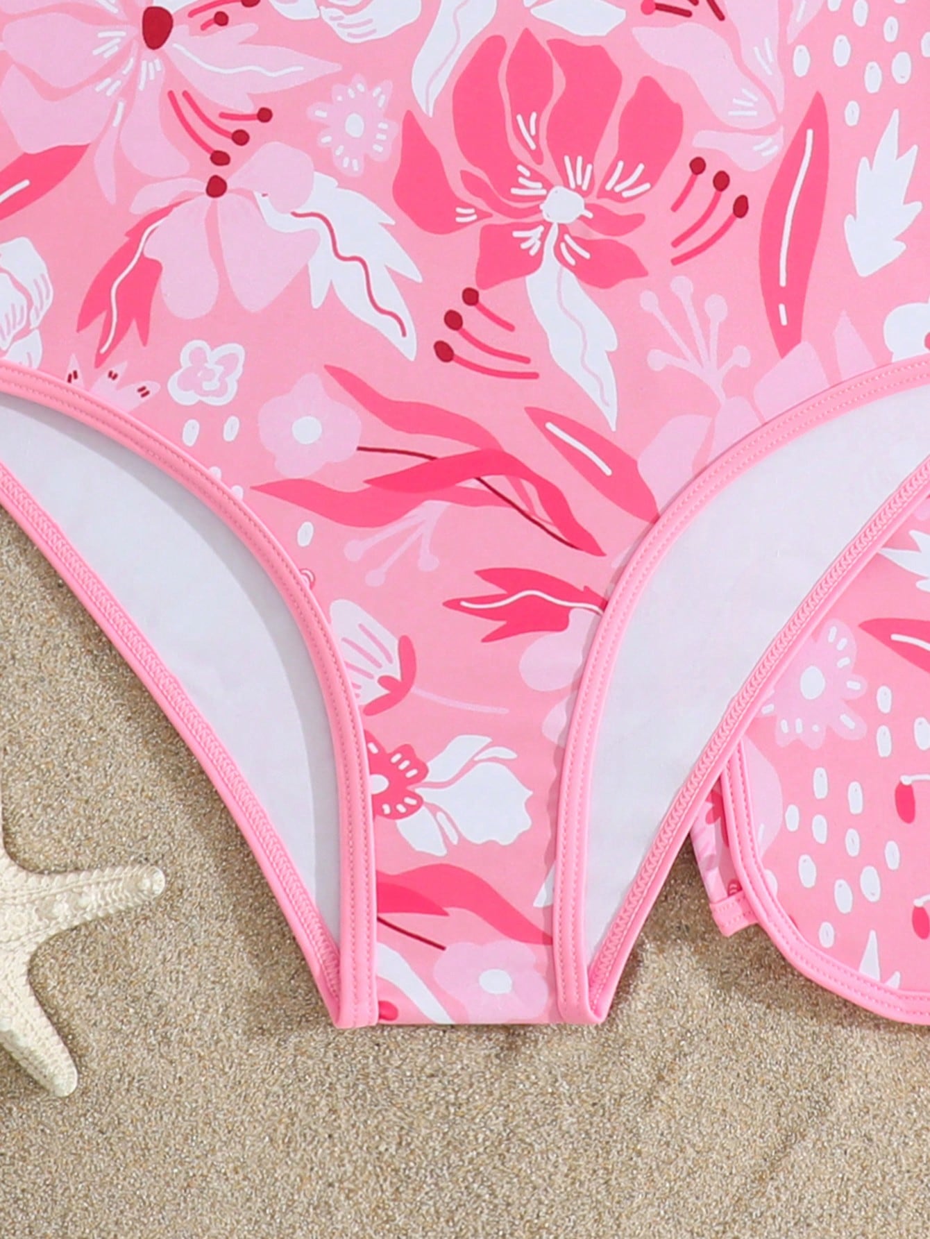 Girls 2-piece swimwear set featuring a butterfly print halter swimsuit top and separate mid-waist shorts in multicolor.