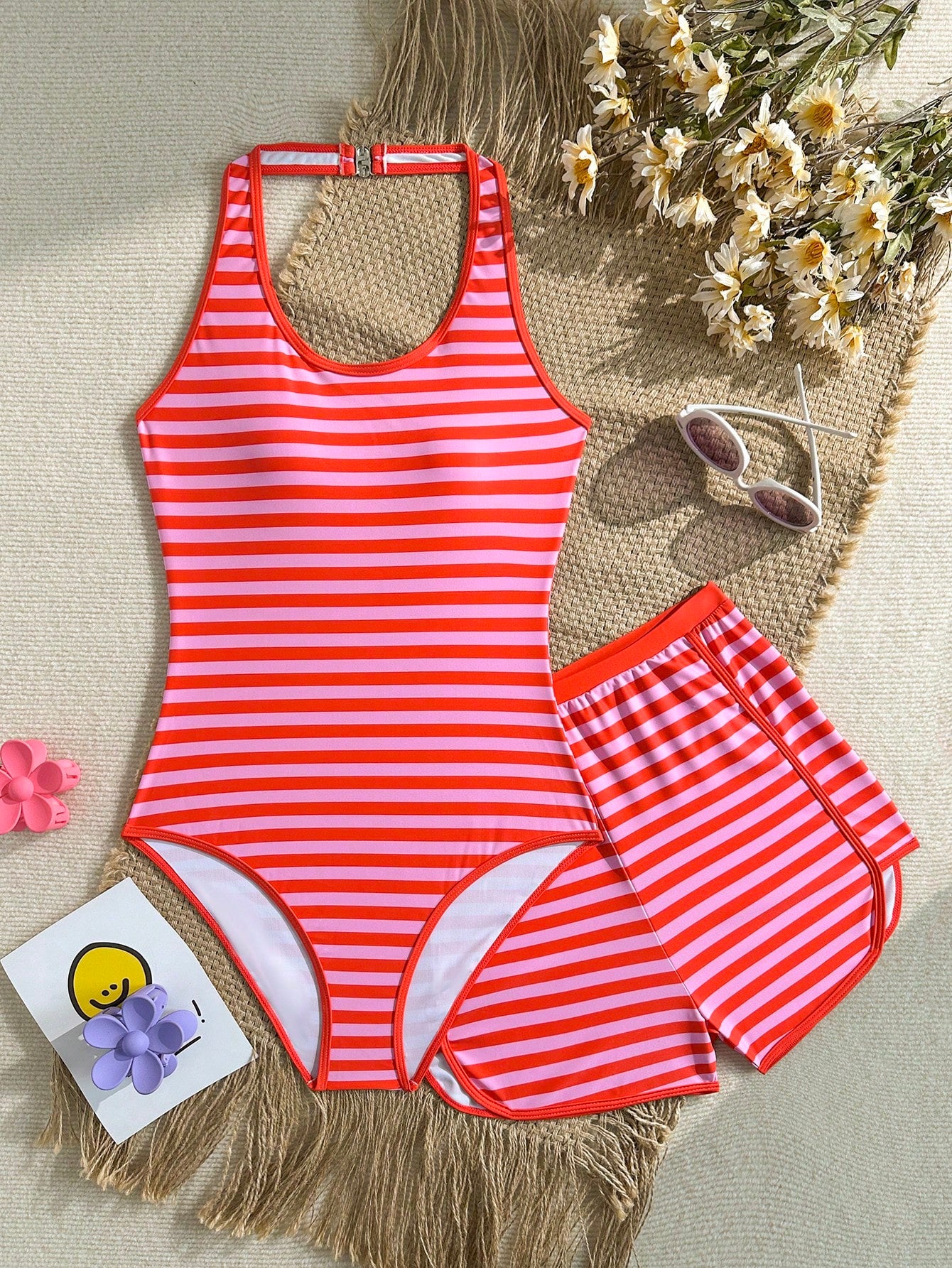 Girls 2-piece swimwear set featuring a butterfly print halter swimsuit top and separate mid-waist shorts in multicolor.