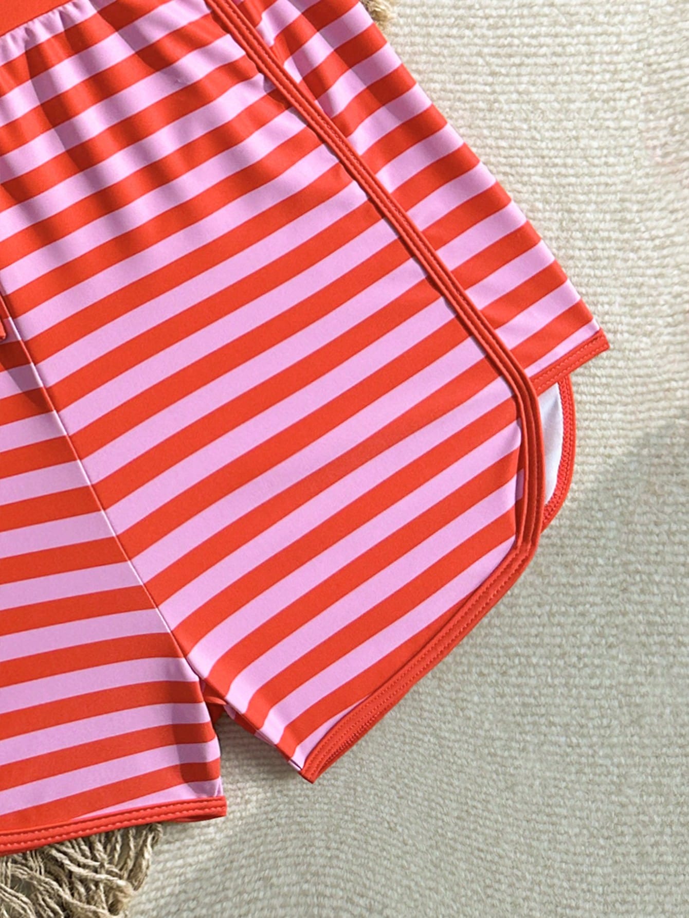 Girls 2-piece swimwear set featuring a butterfly print halter swimsuit top and separate mid-waist shorts in multicolor.