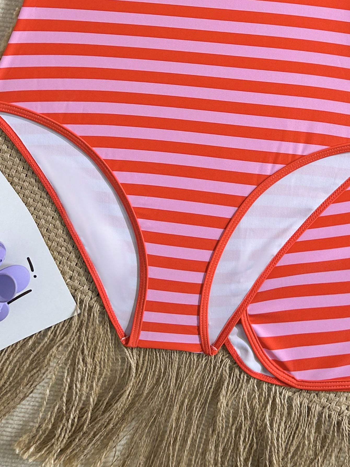 Girls 2-piece swimwear set featuring a butterfly print halter swimsuit top and separate mid-waist shorts in multicolor.