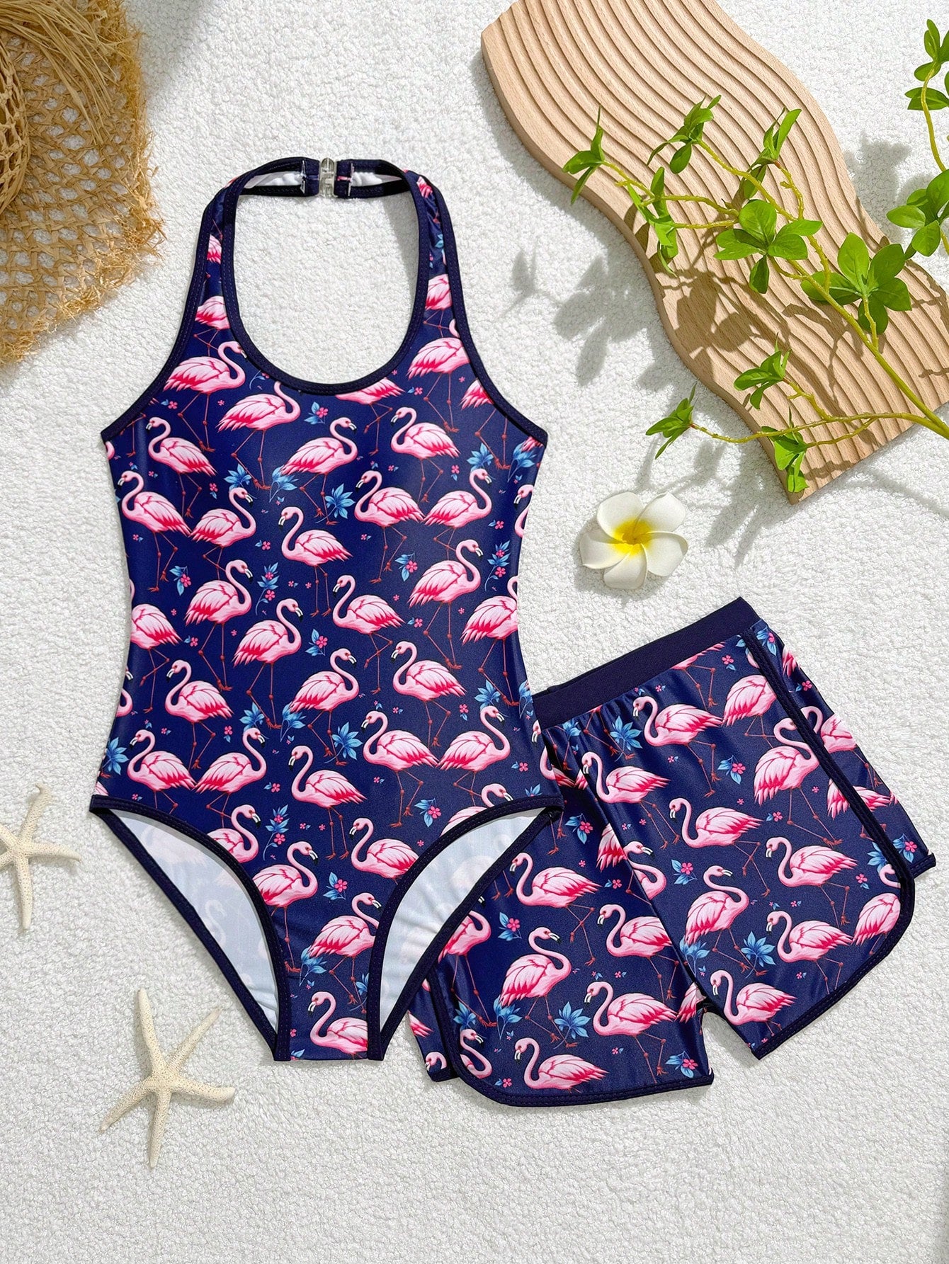 Girls 2-piece swimwear set featuring a butterfly print halter swimsuit top and separate mid-waist shorts in multicolor.