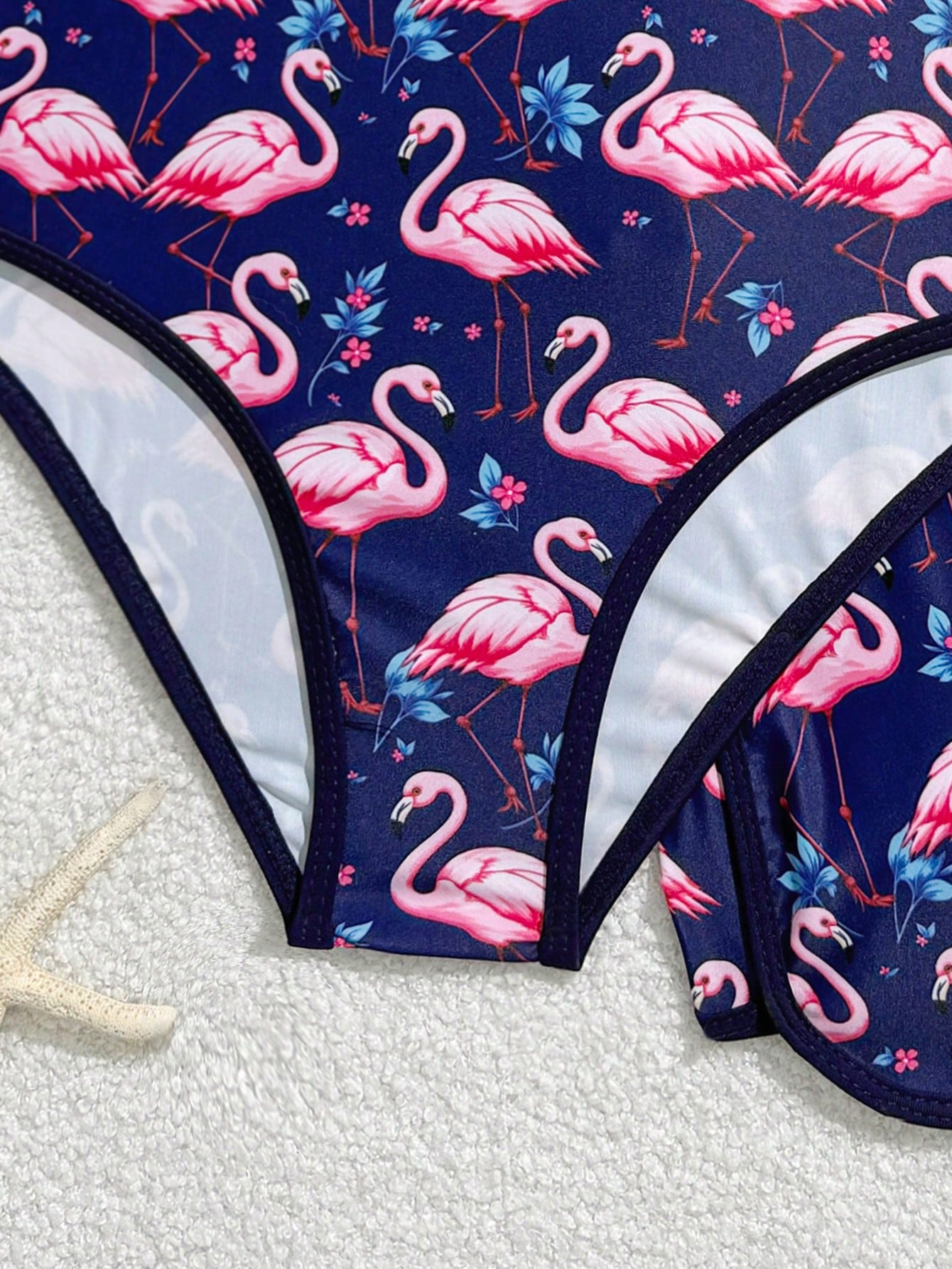 Girls 2-piece swimwear set featuring a butterfly print halter swimsuit top and separate mid-waist shorts in multicolor.