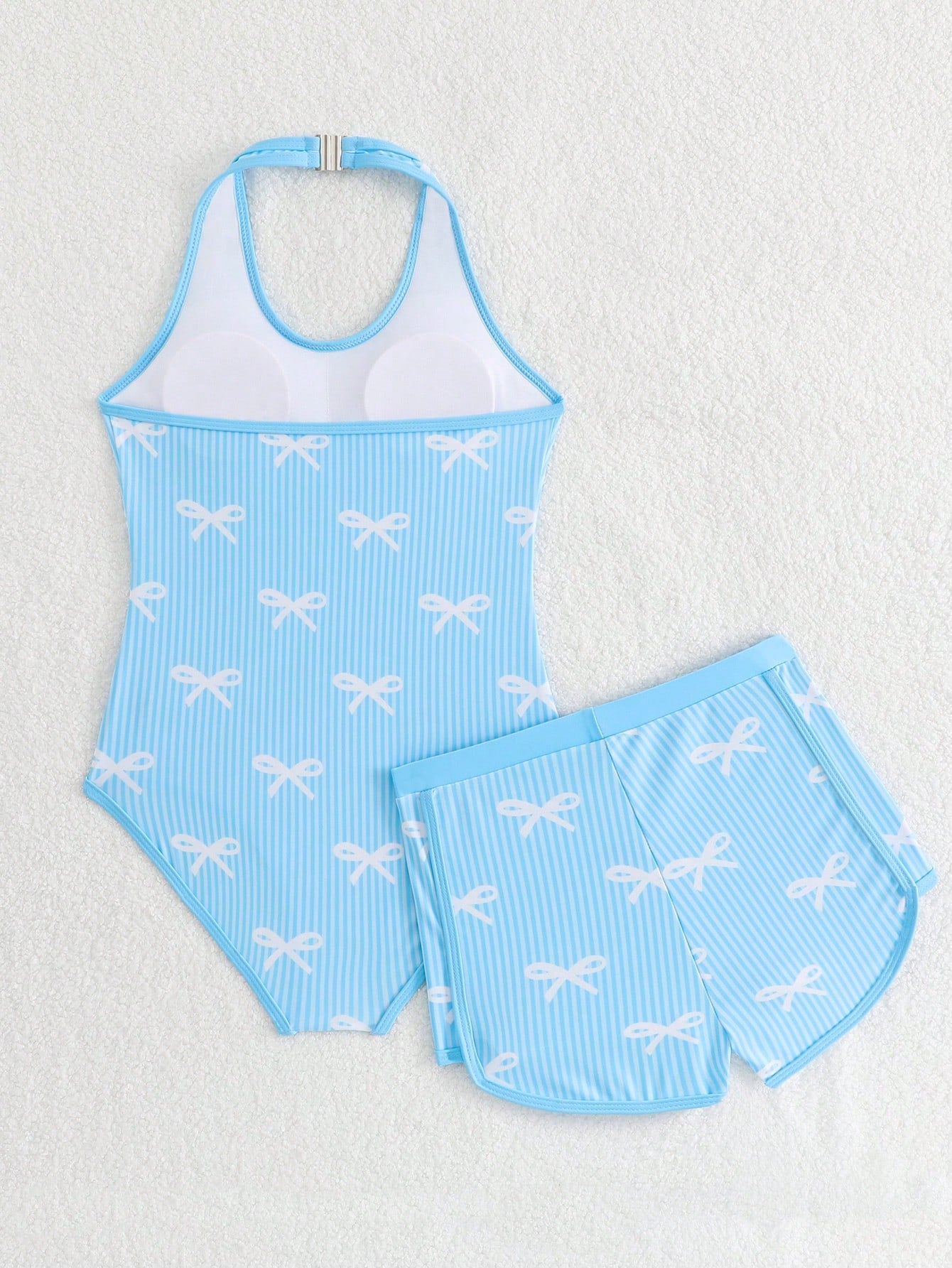 Girls 2-piece swimwear set featuring a butterfly print halter swimsuit top and separate mid-waist shorts in multicolor.