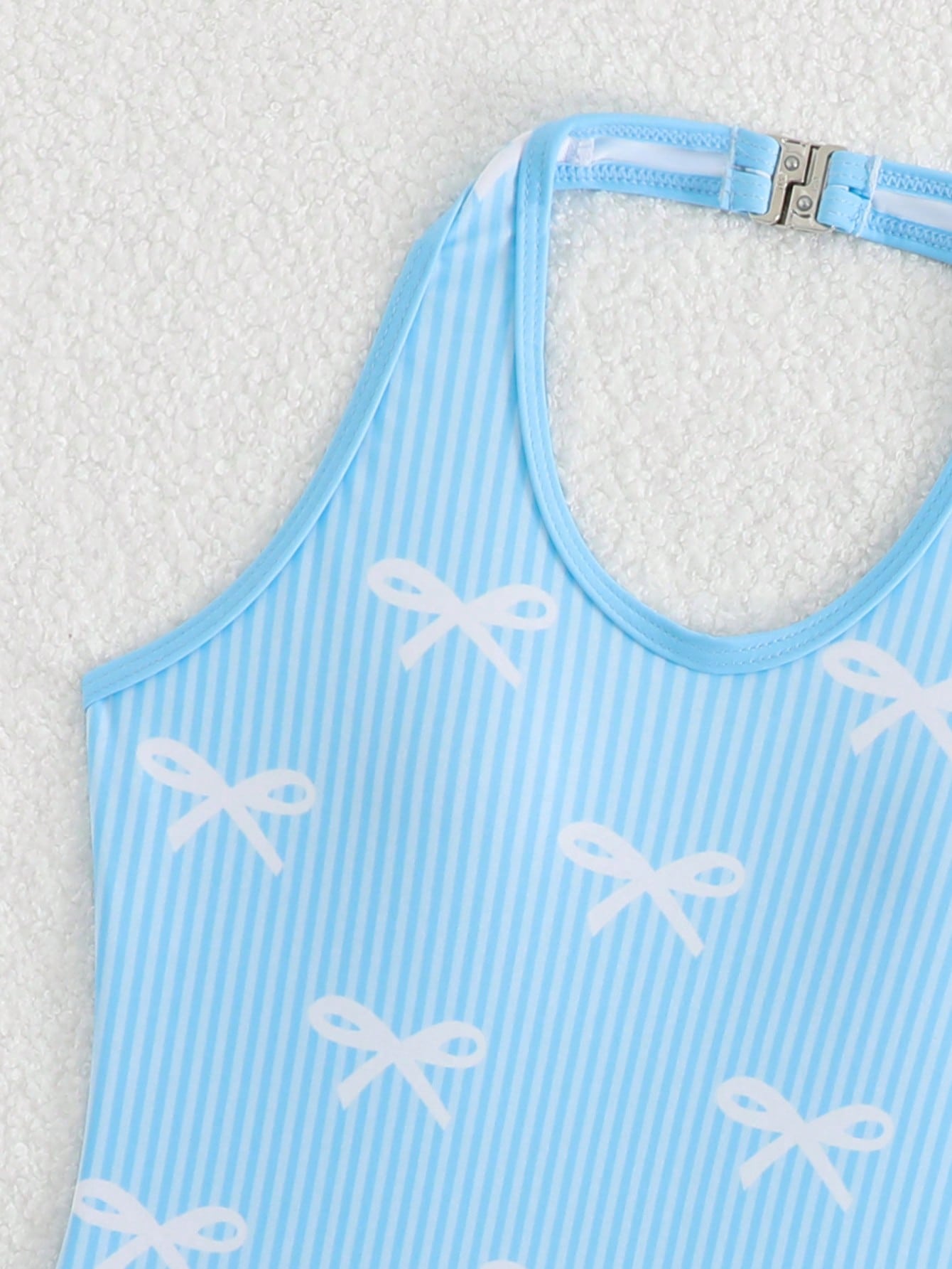 Girls 2-piece swimwear set featuring a butterfly print halter swimsuit top and separate mid-waist shorts in multicolor.