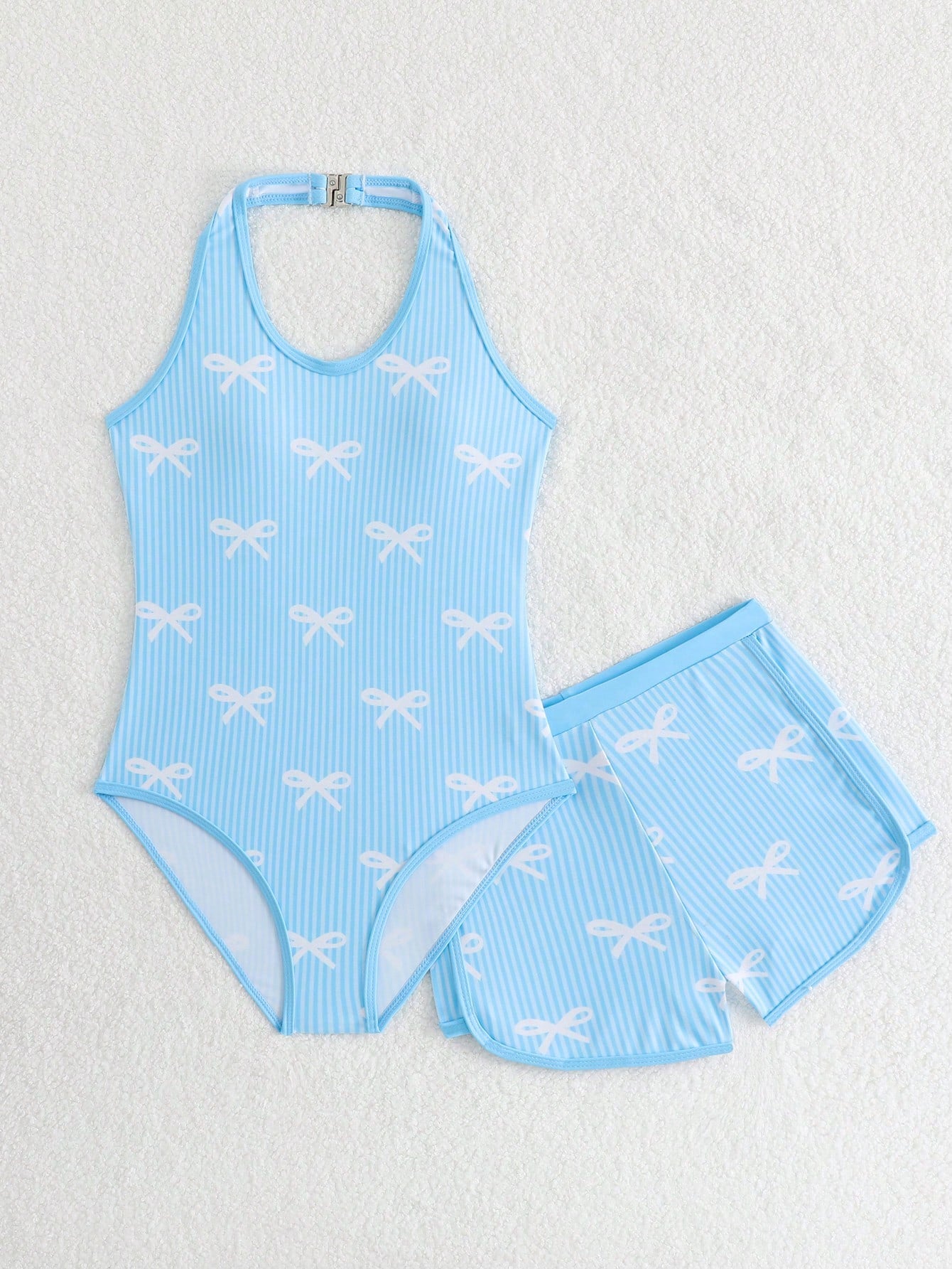 Girls 2-piece swimwear set featuring a butterfly print halter swimsuit top and separate mid-waist shorts in multicolor.