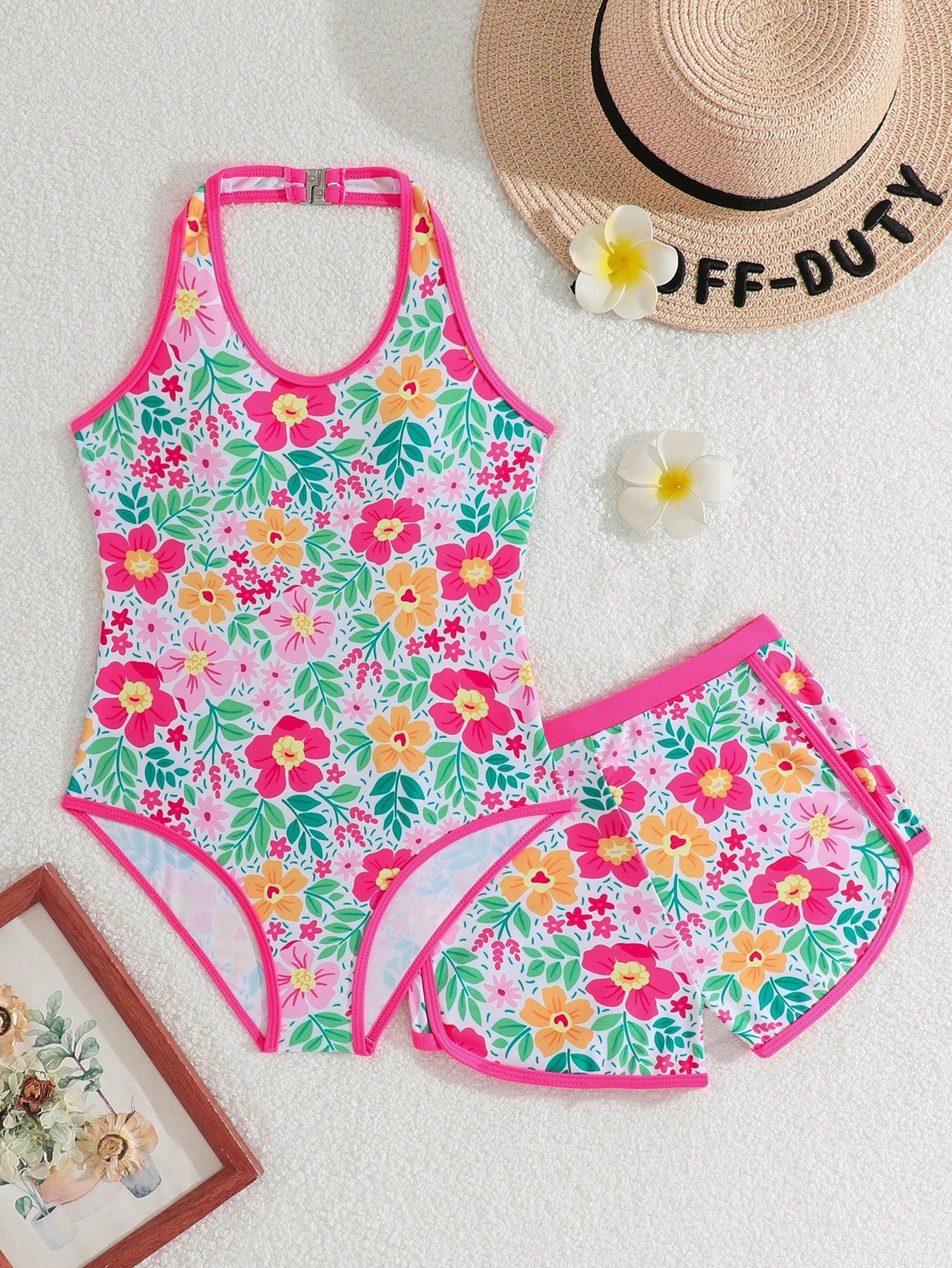 Girls 2-piece swimwear set featuring a butterfly print halter swimsuit top and separate mid-waist shorts in multicolor.